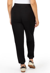 Wrinkle-free black bamboo pants, ideal for long flights and casual outings. soft, lightweight, breathable.